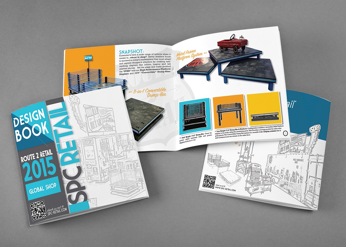 Multiple copies of the 2015 Global Shop Design Book spread out on a table