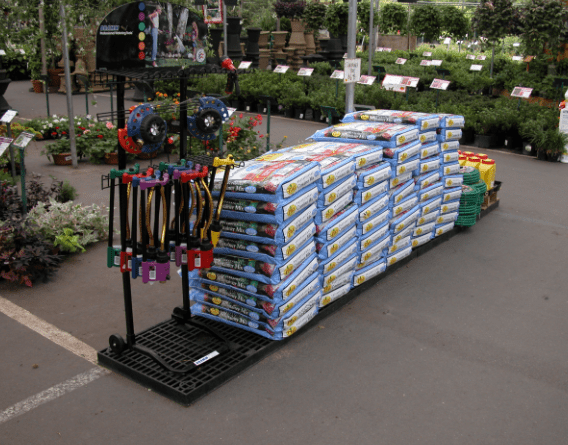 plastic stand holding gardening supplies