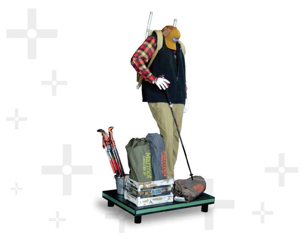 plastic stand holding mannequin and outdoor goods
